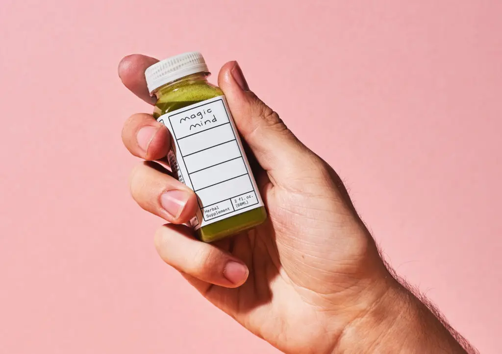 bottle with preparation made from algae extracts for supplements